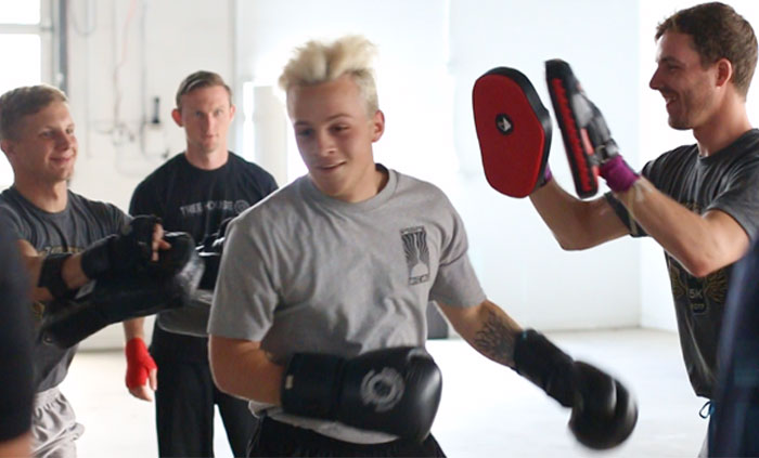 Team pad-work conditioning class