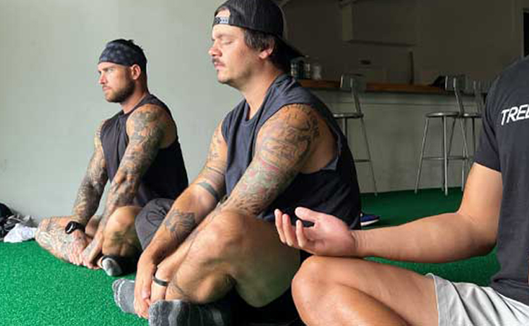 Group mindfulness training on the turf